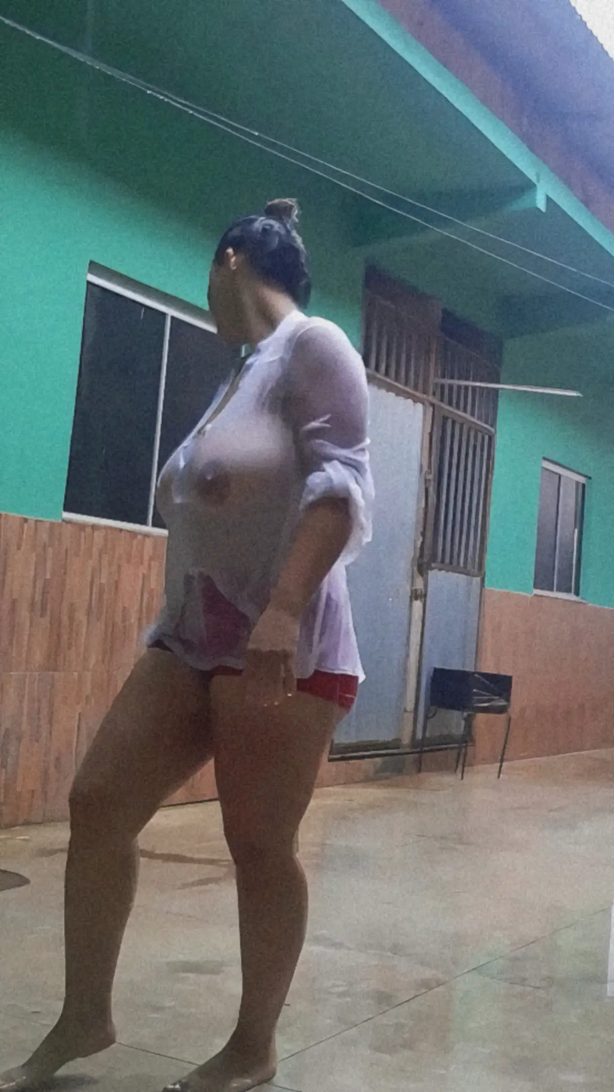 Naughty big tits recording live in the rain