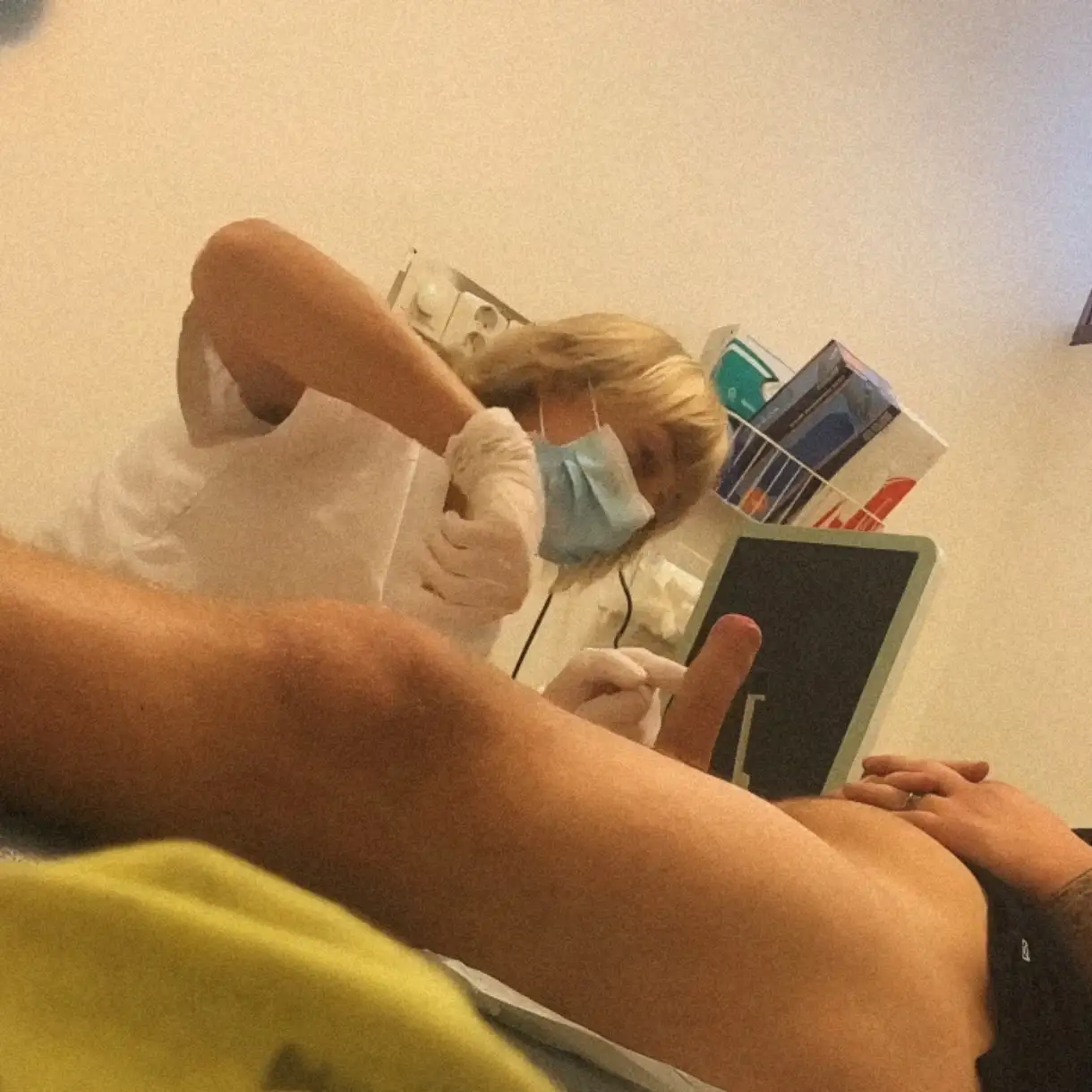 Mature doctor examining the dick