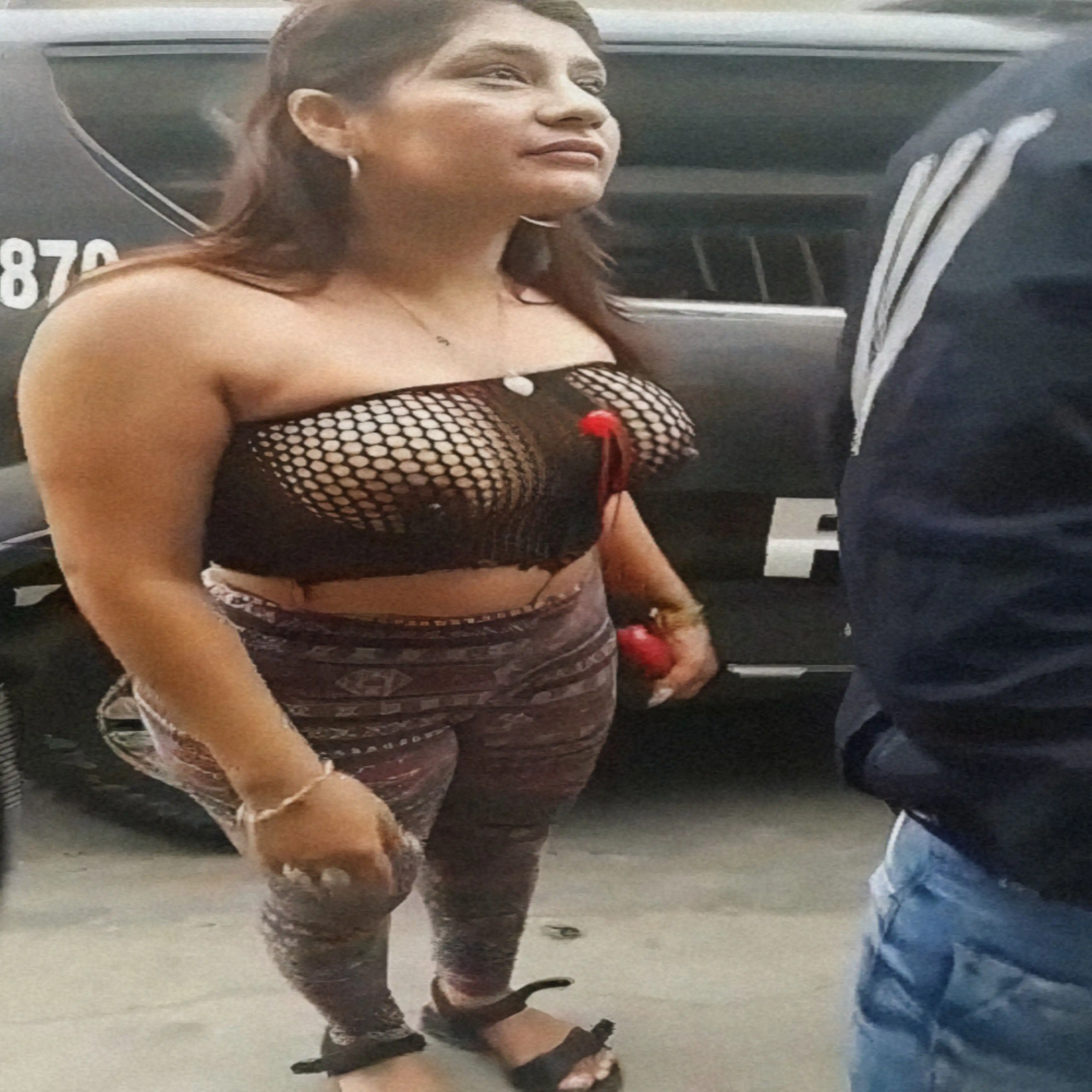Busty Latina in See-Through Outfit on the Street