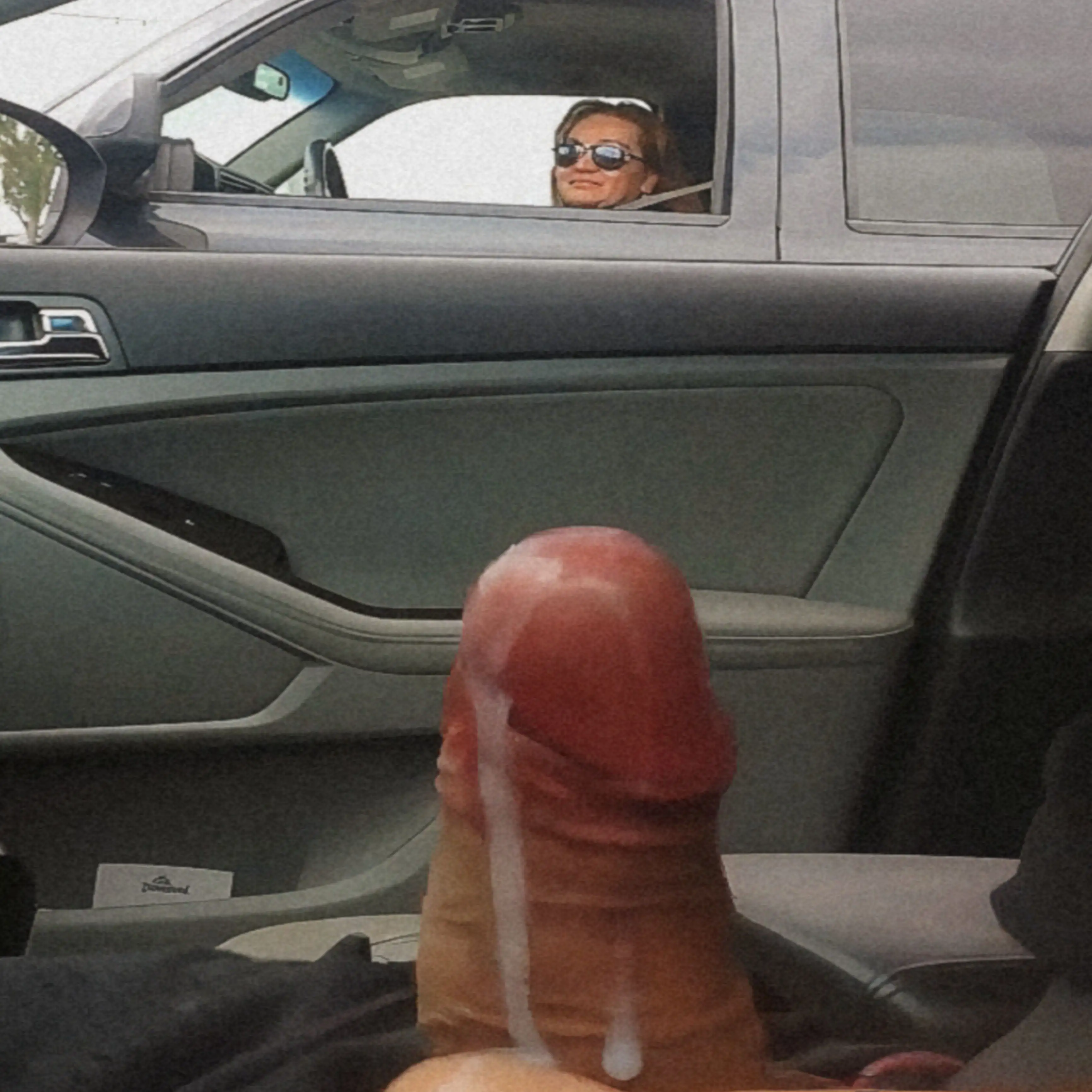 Blonde Milf watching the cumshot at the traffic light