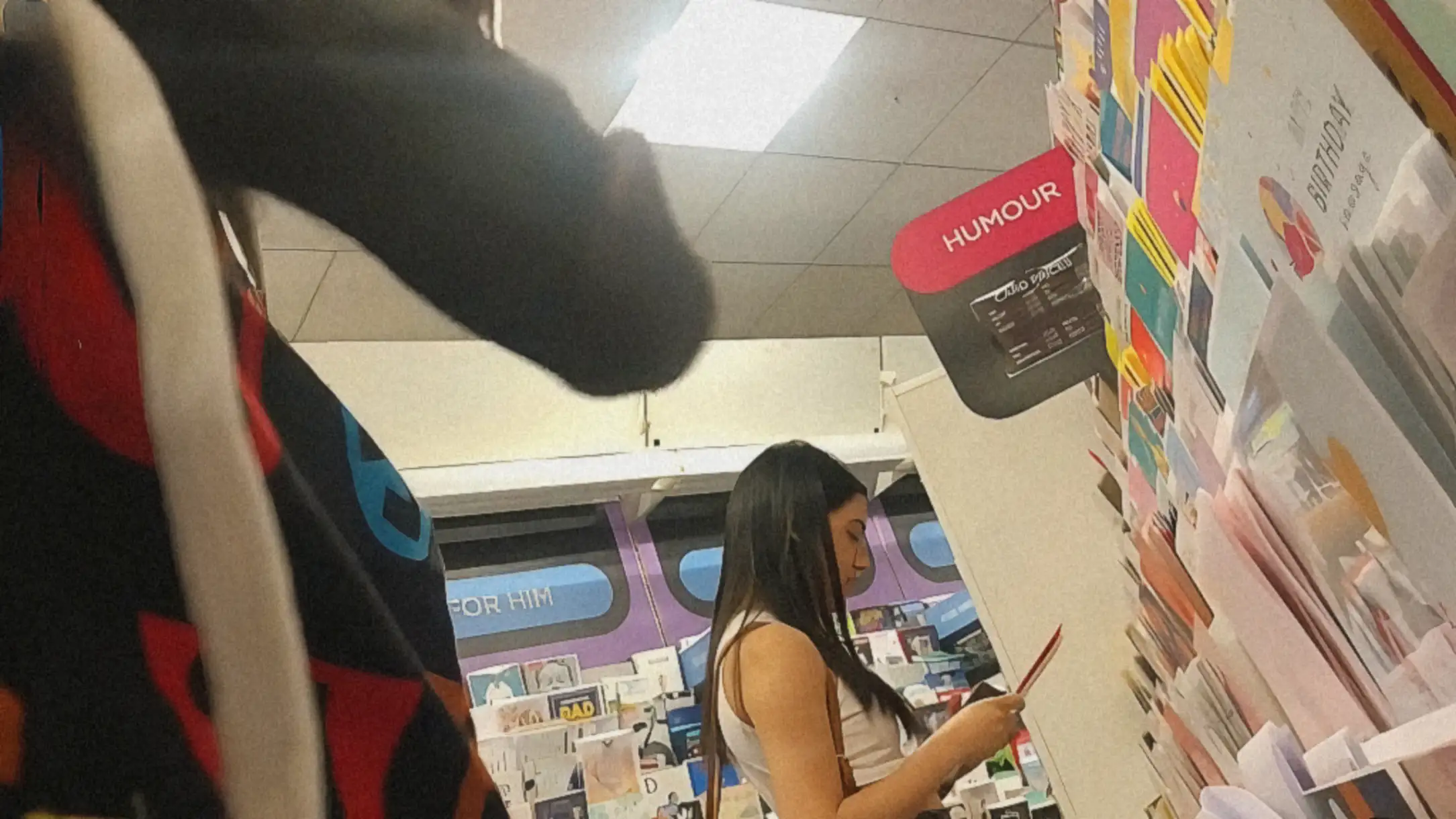 Beautiful brunette teen in the store