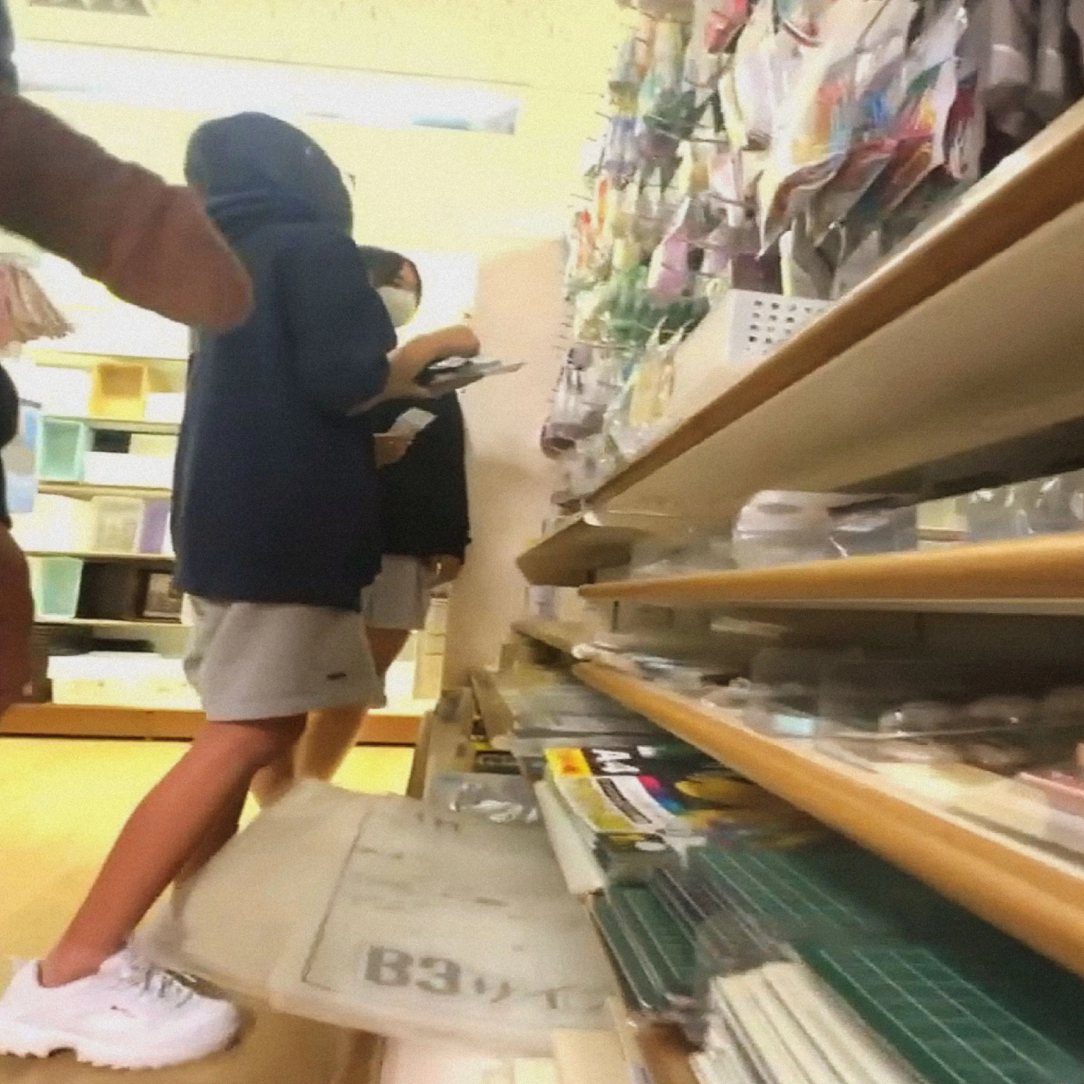 Two Japanese teens in the store