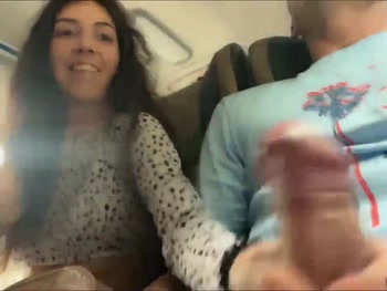 Young girl jerking off her boyfriend on the bus.