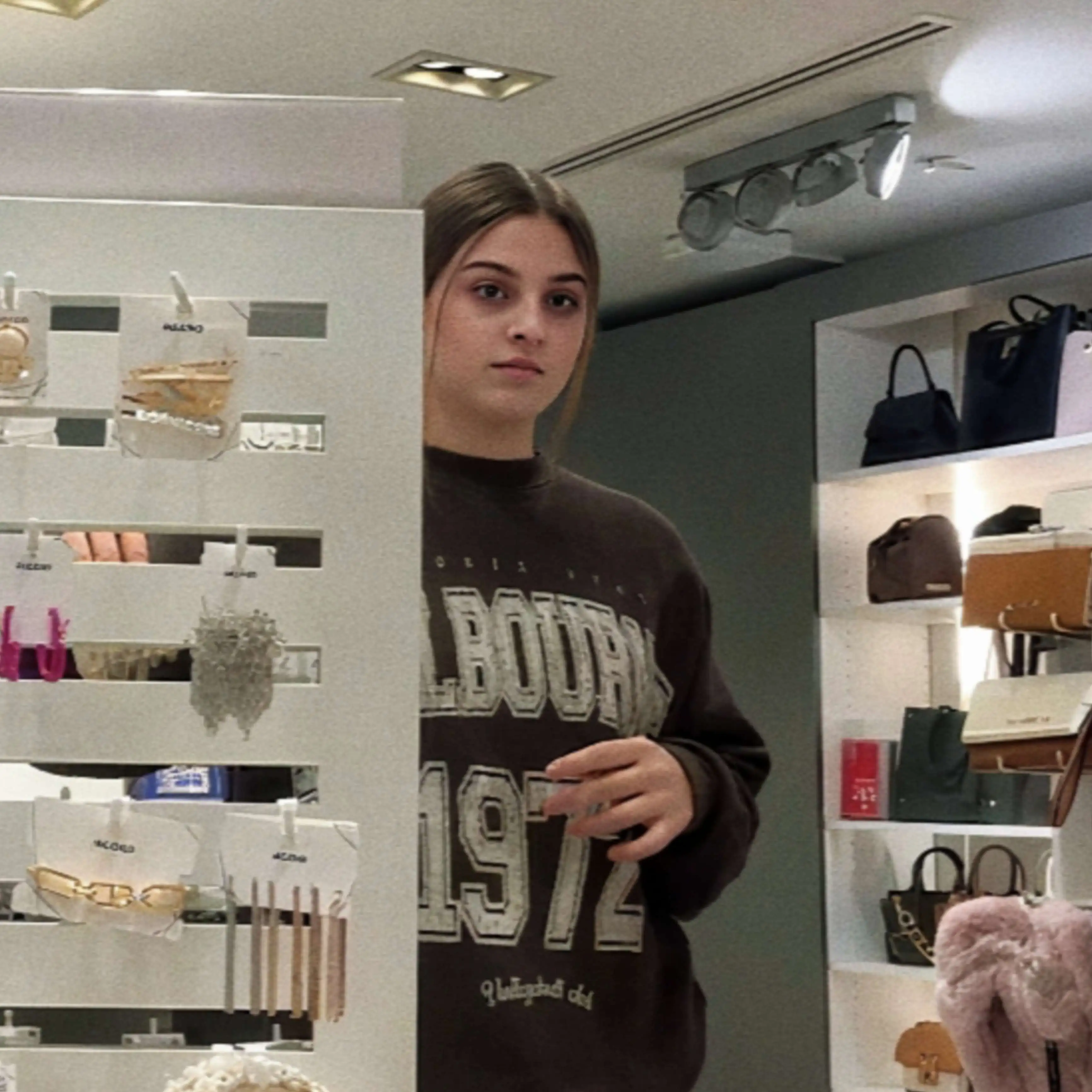 Saleswomen looking at bulge in store