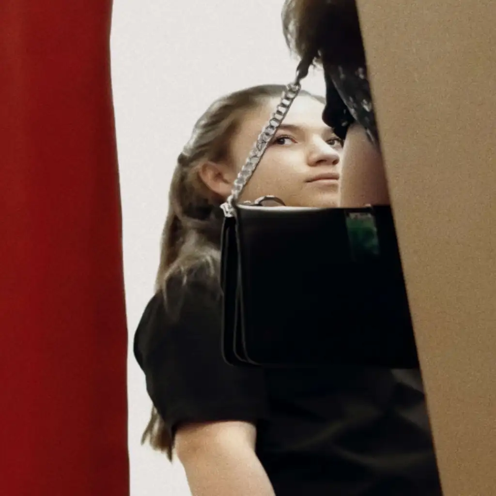 Sexy saleswoman looking dick customer in the fitting room