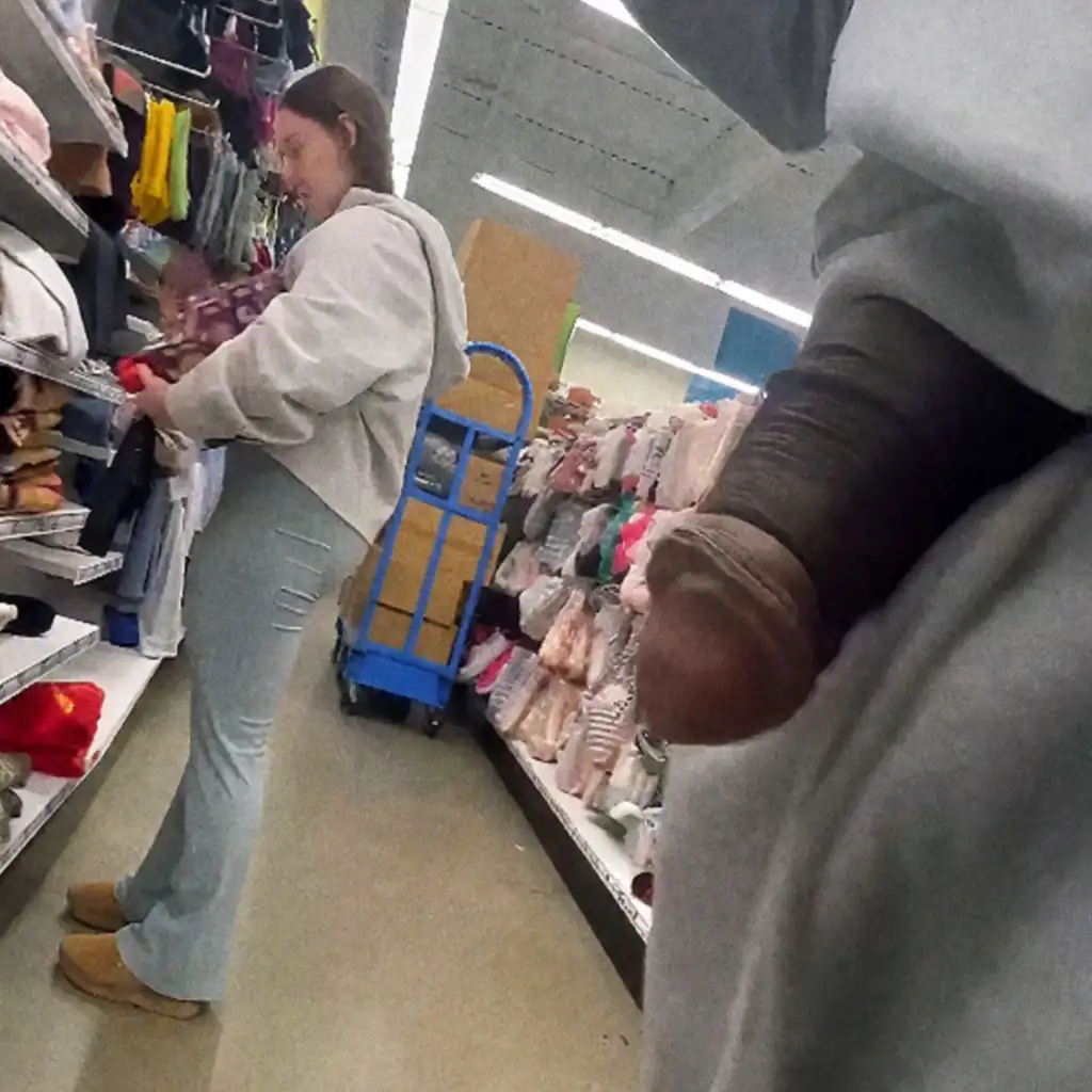 Hottie looking at the products in the store and then looked at the black dick
