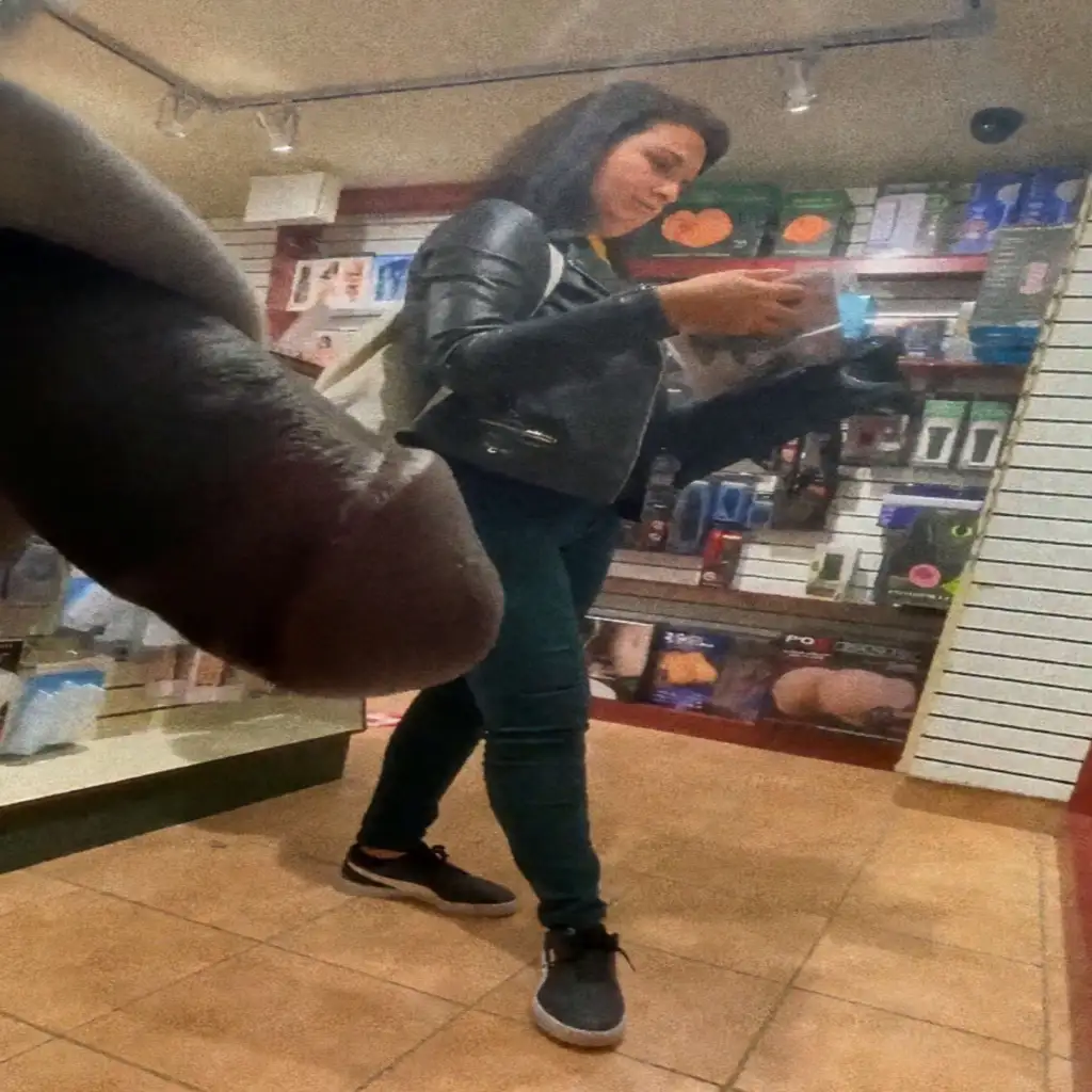 Sexy milf looked at black dick in store