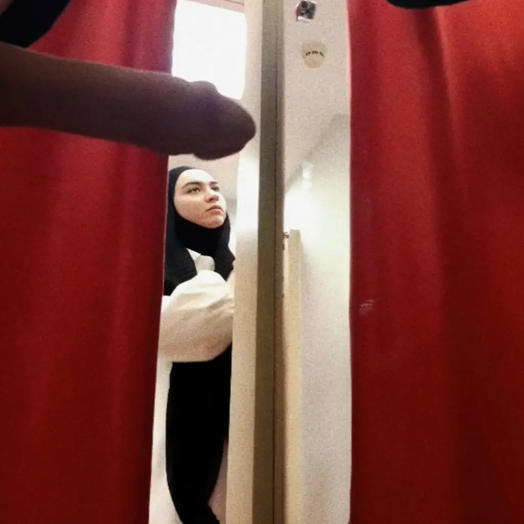 Friends looking at big dicks in the fitting room