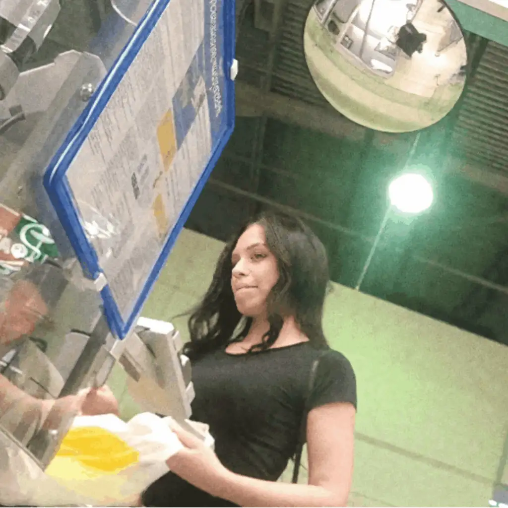 Hot slut looking at the dick at the supermarket checkout