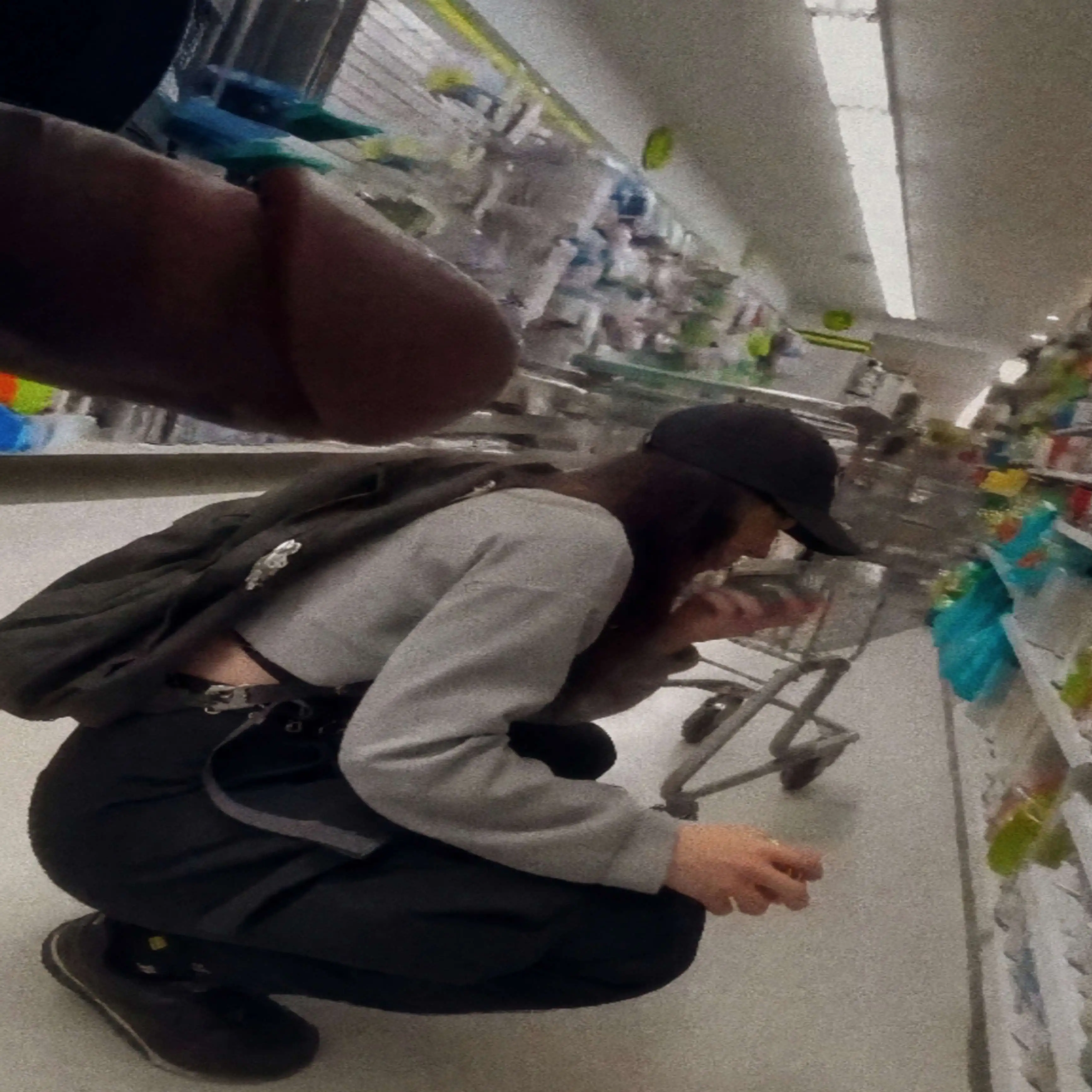 Hot teen looking at products in the store