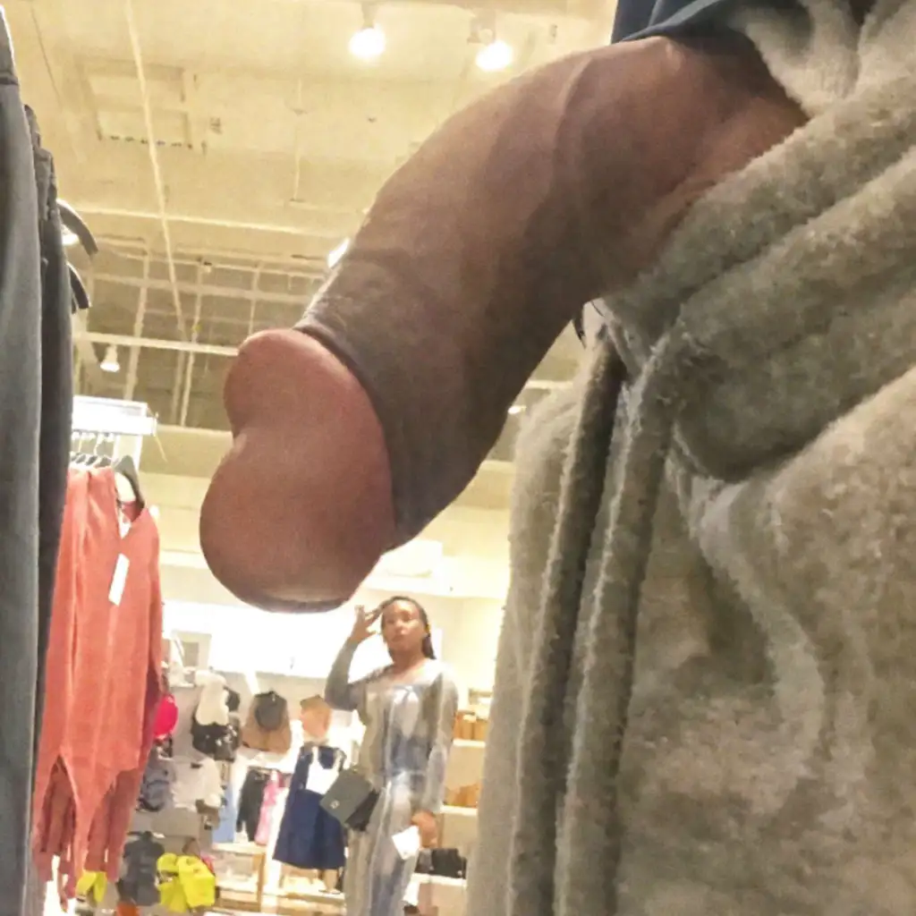 Hot ebony in the clothing store, she looked at the black dick
