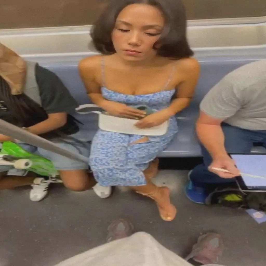 Beautiful brunette looked bulge on the train
