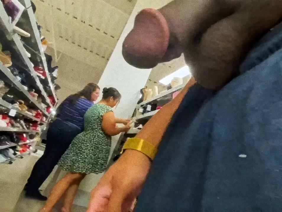 Chubby mother and daughter in the store