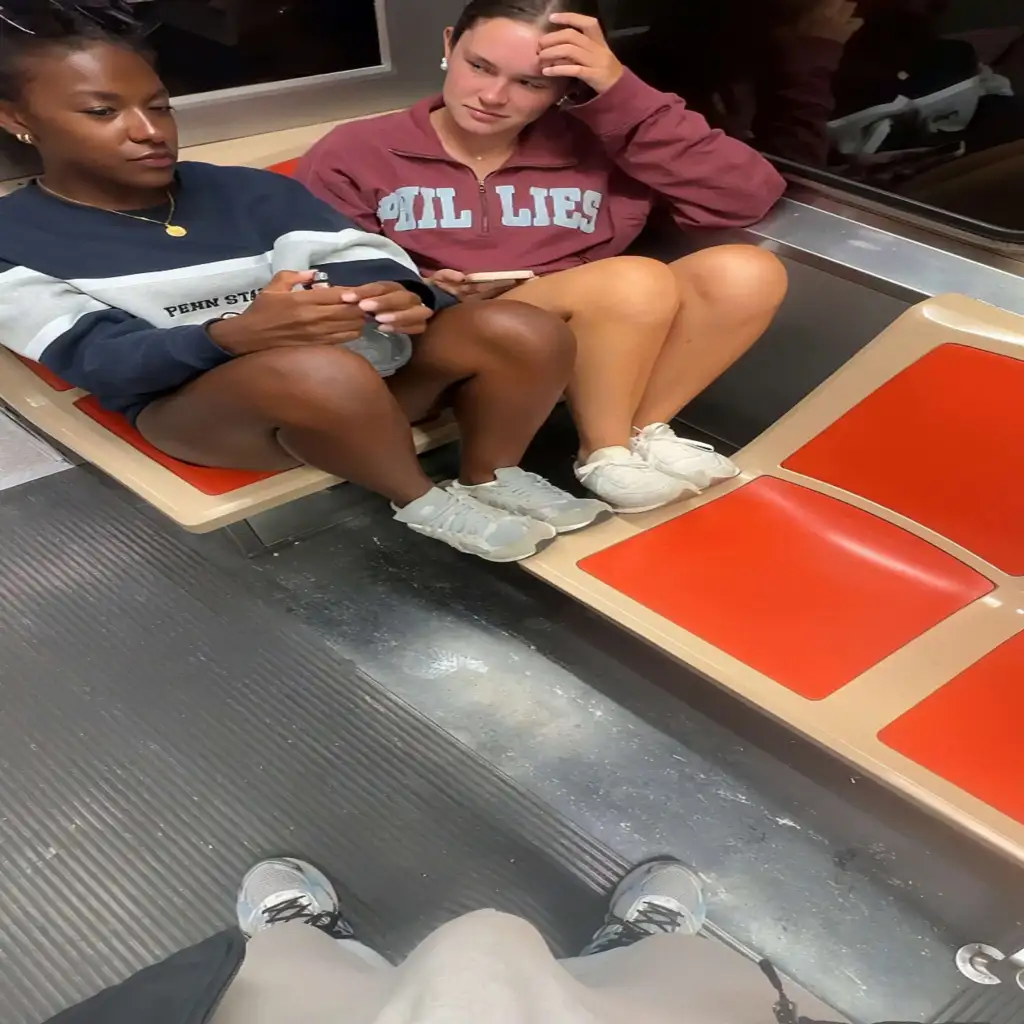 Two hot friends looking bulge on the train, they even took a picture!