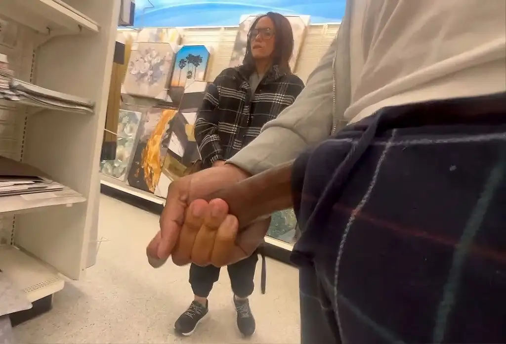 Damn! Hottie got horny in the store next to the black dick, she even bit her lips with lust