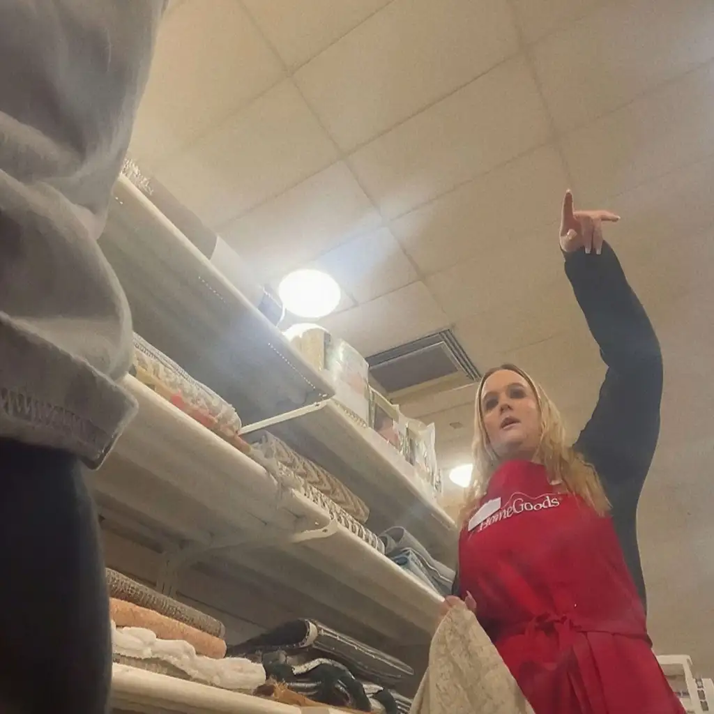 Hot blonde store employee looking at big bulge flash