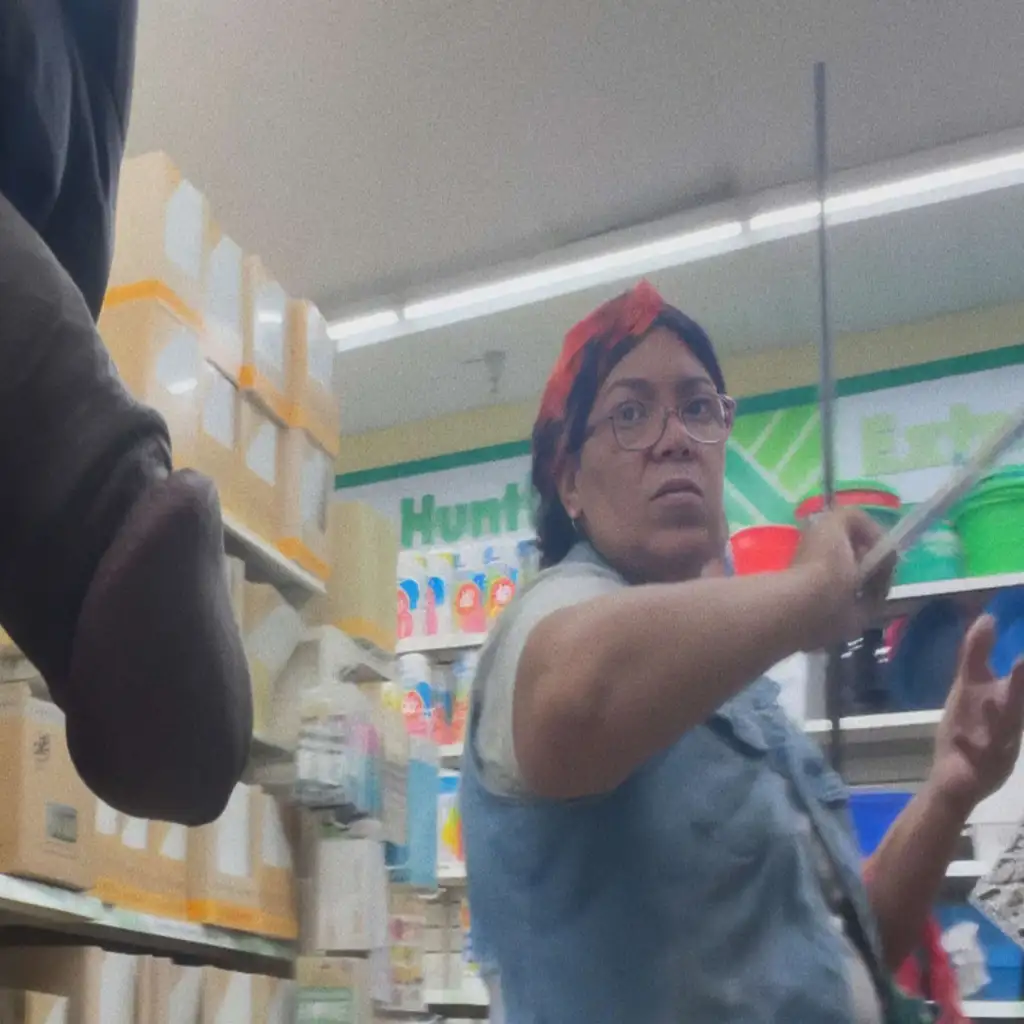 Black lady looking at big dick in store