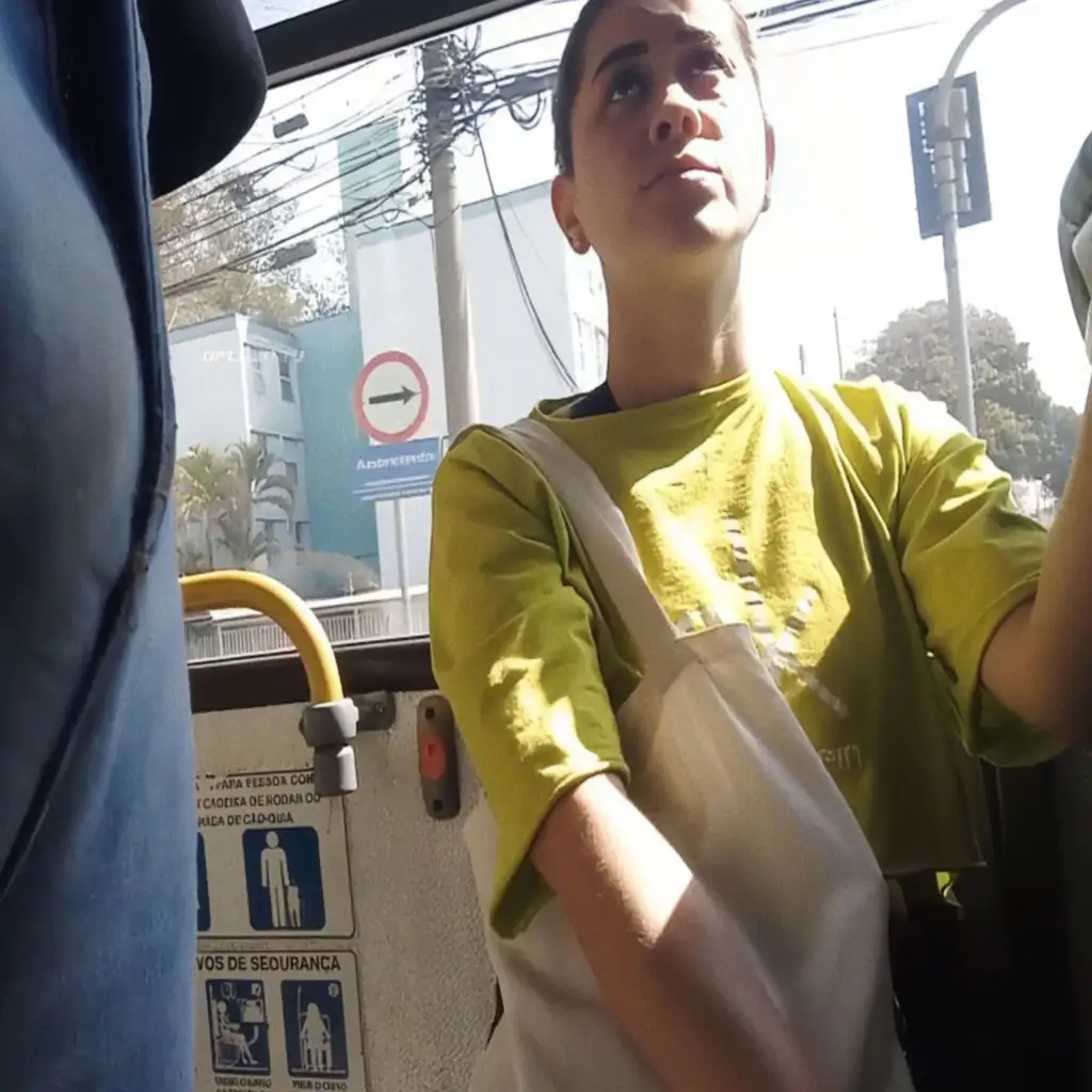 Suspicious Brazilian milf looking at bulge on the bus
