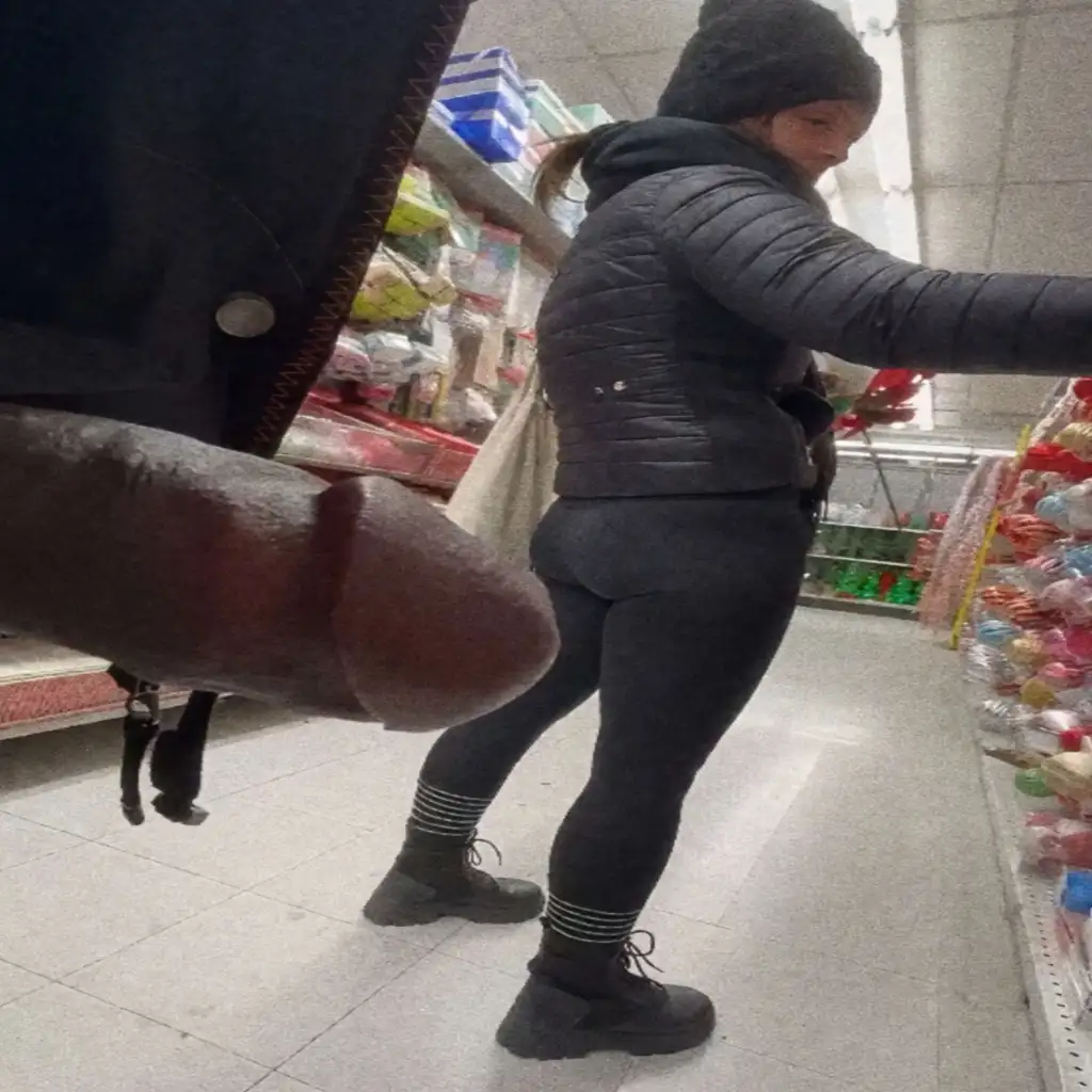 Hot milf looking at products in the store