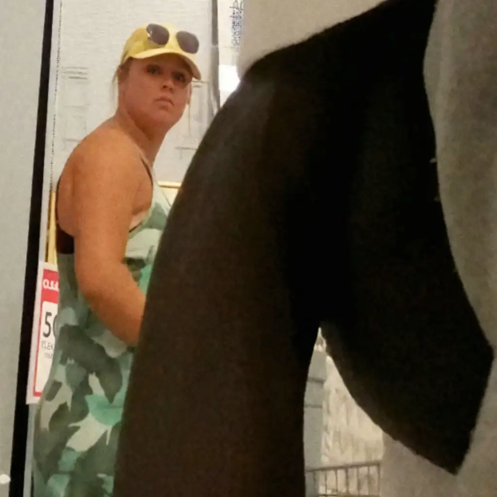 Blonde milf looking at huge black dick outside in the store