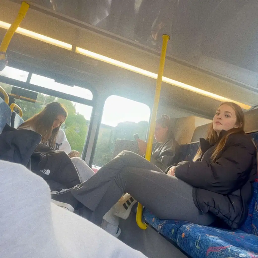 Friends looking at the bulge on the train, they liked it