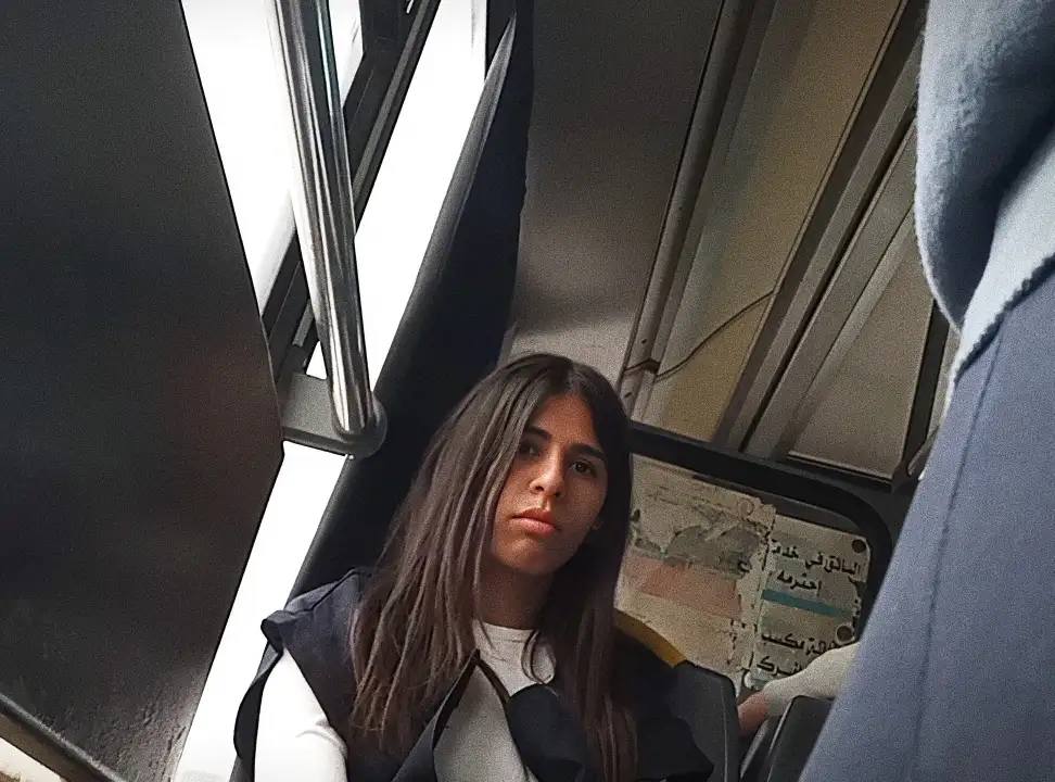 Young sexy Arab looking bulge on the bus