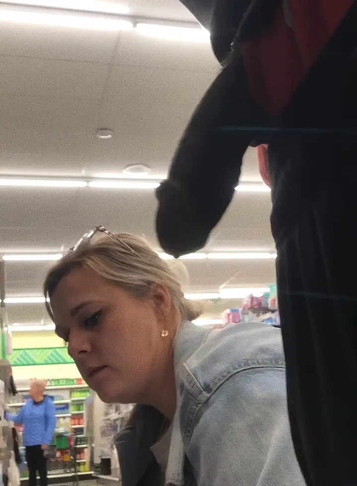 Hot blonde with her face close to the black dick