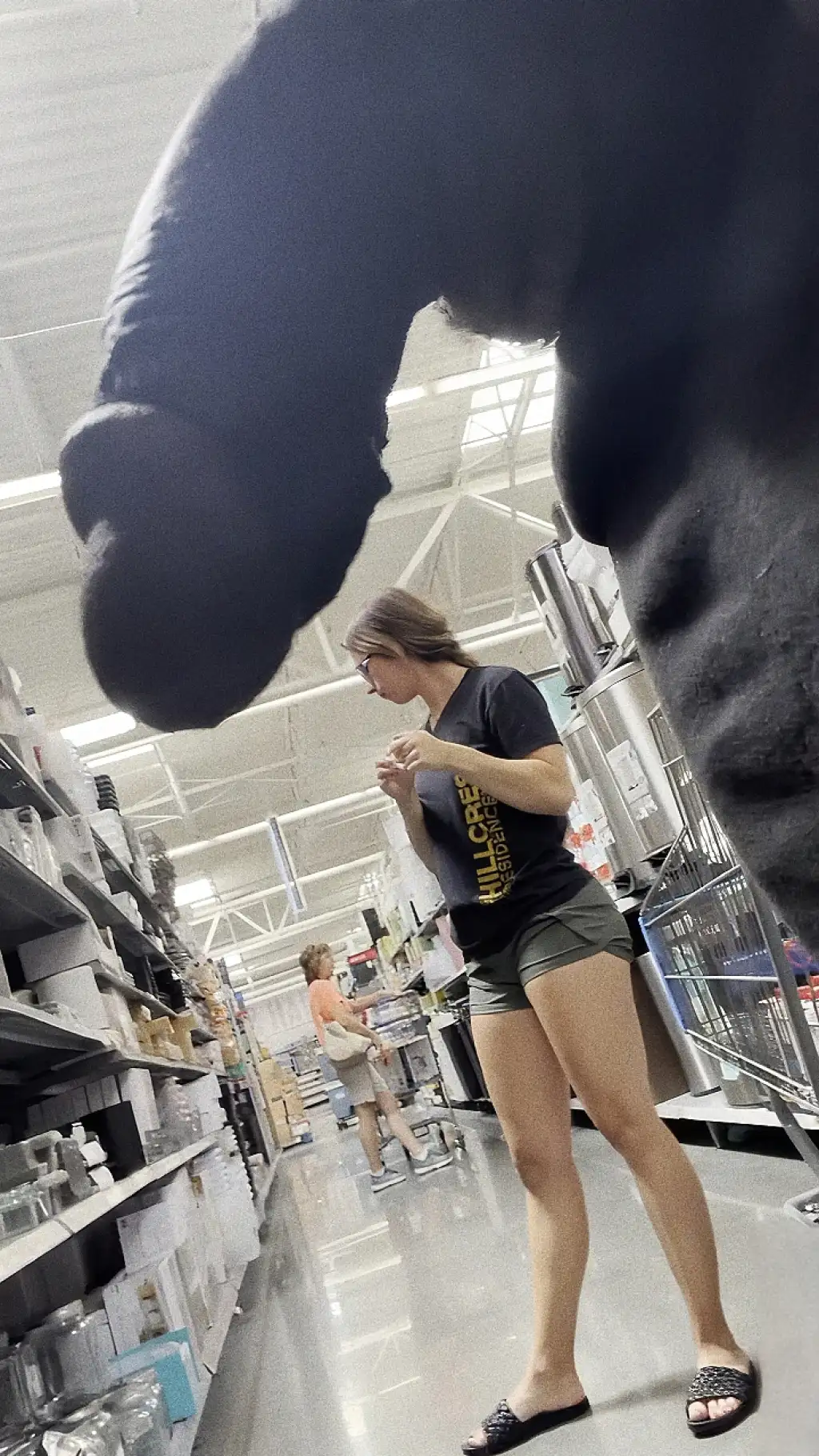 Huge black dick out and hottie looking at the products in the store