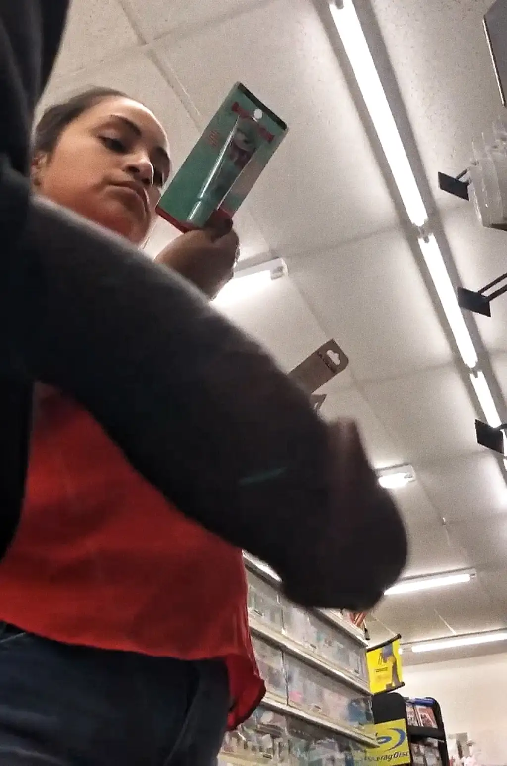 Sexy Latina brunette looking at the product and then the black dick