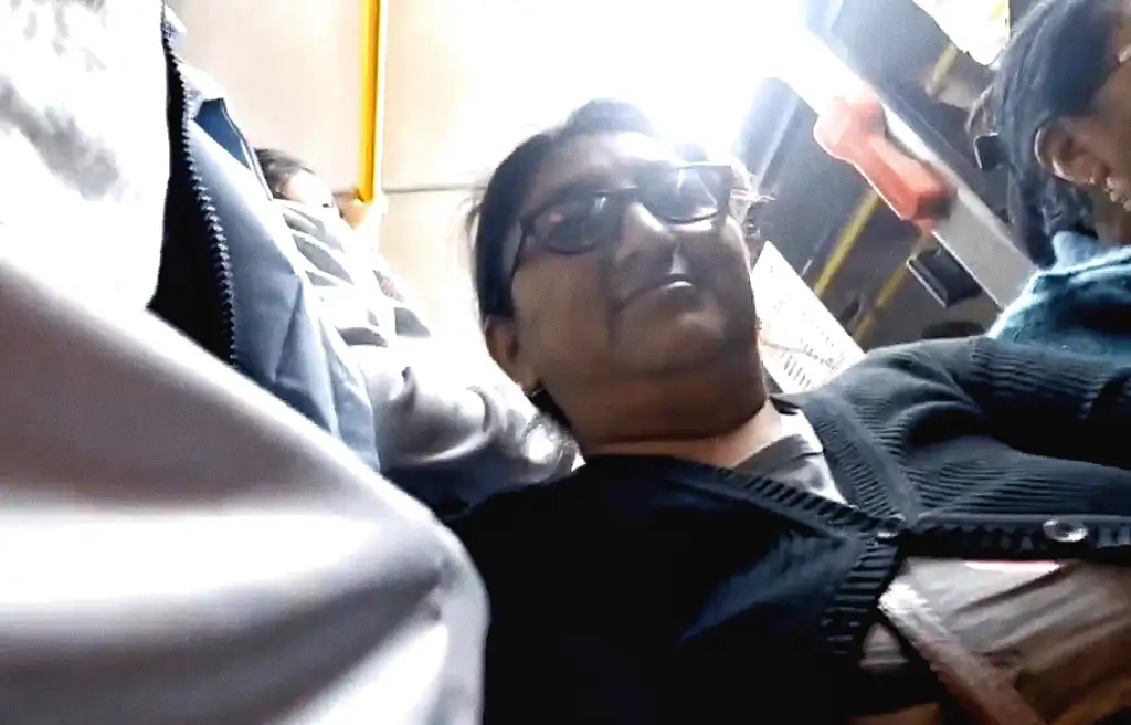 Mature Latina slut smiling and looking at the bulge on the bus
