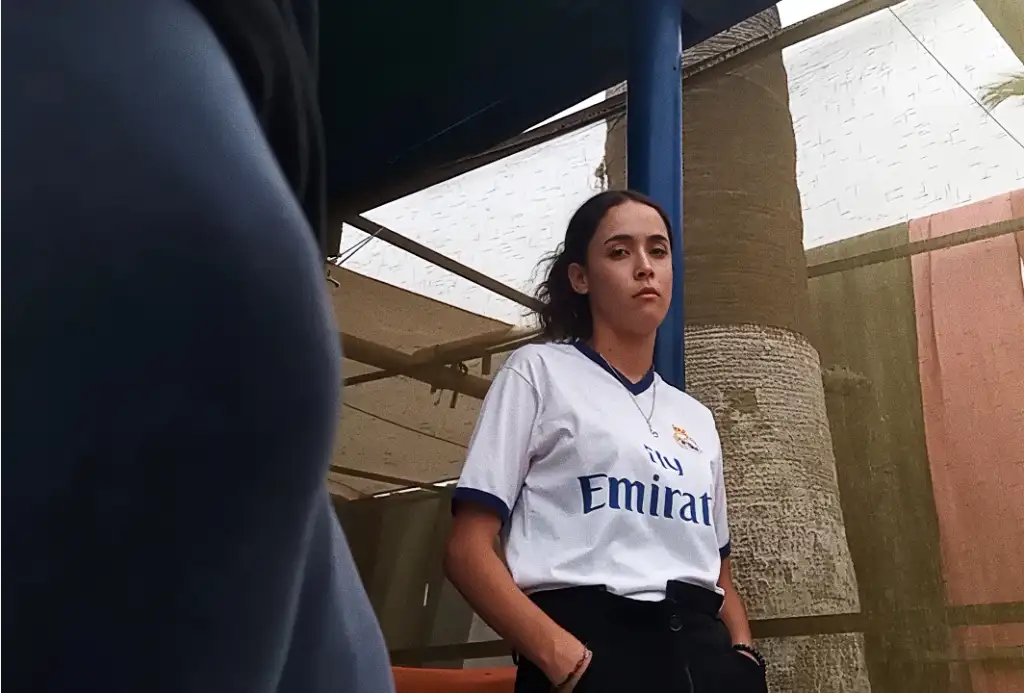 Hot teen Real Madrid fan looking at bulge at bus stop