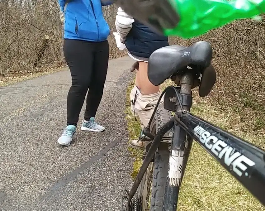 Hot friendly runner helping the poor guy in the street