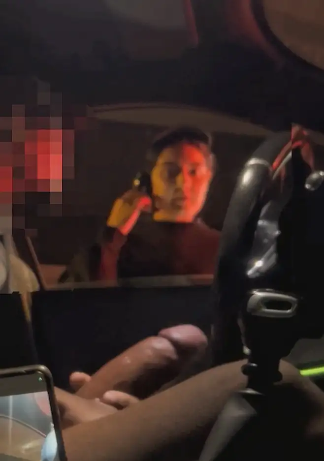 Sexy drive-thru employee looking at a giant cock