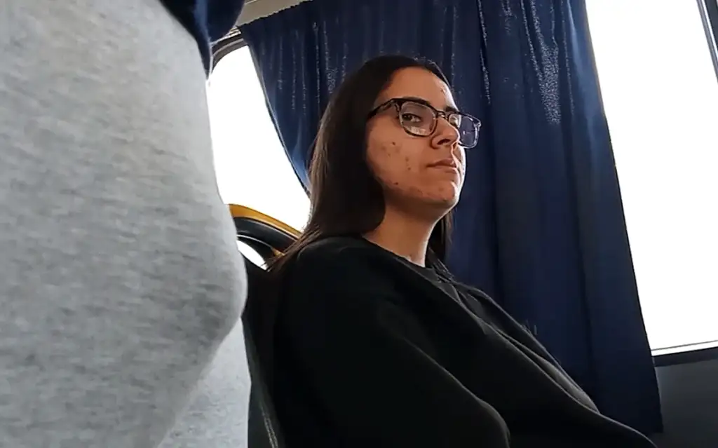 Sexy nerd glancing sideways at a dick