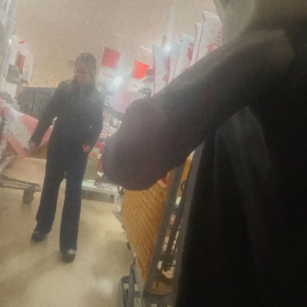 Sexy blonde looking at the products