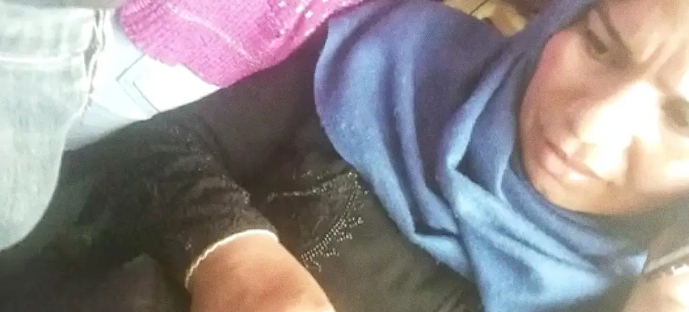 MILF Hijab looking at a bulge and touching