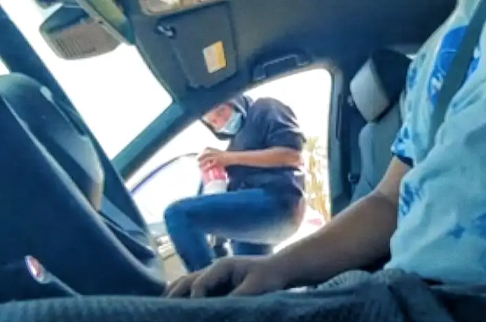 Giving a ride to a Latina on the street