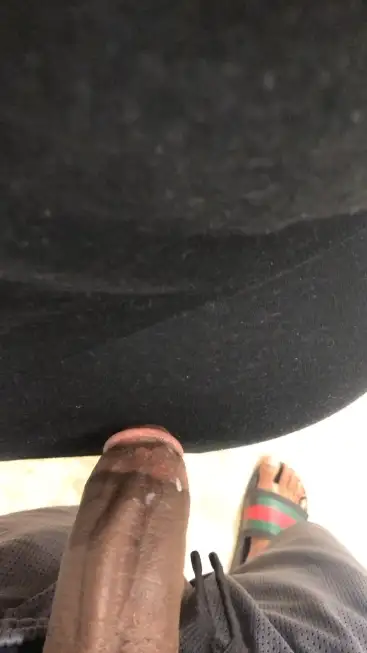 A black dick touching the huge ass of a mature black in the store; she doesn't care