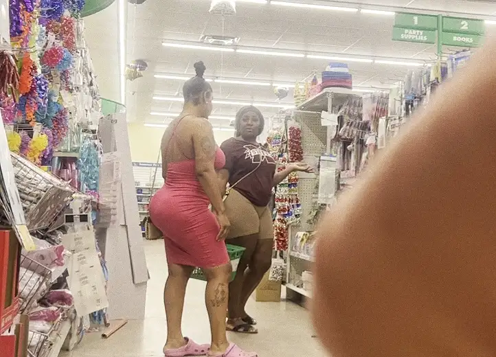 Two hot girls with big butts in the store