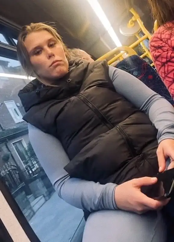 Blonde admiring the bulge on the train