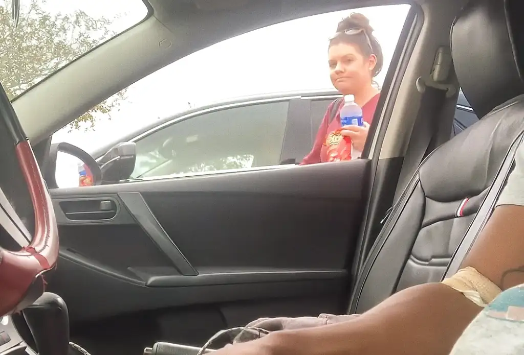 Brunette reacting to cock in the car