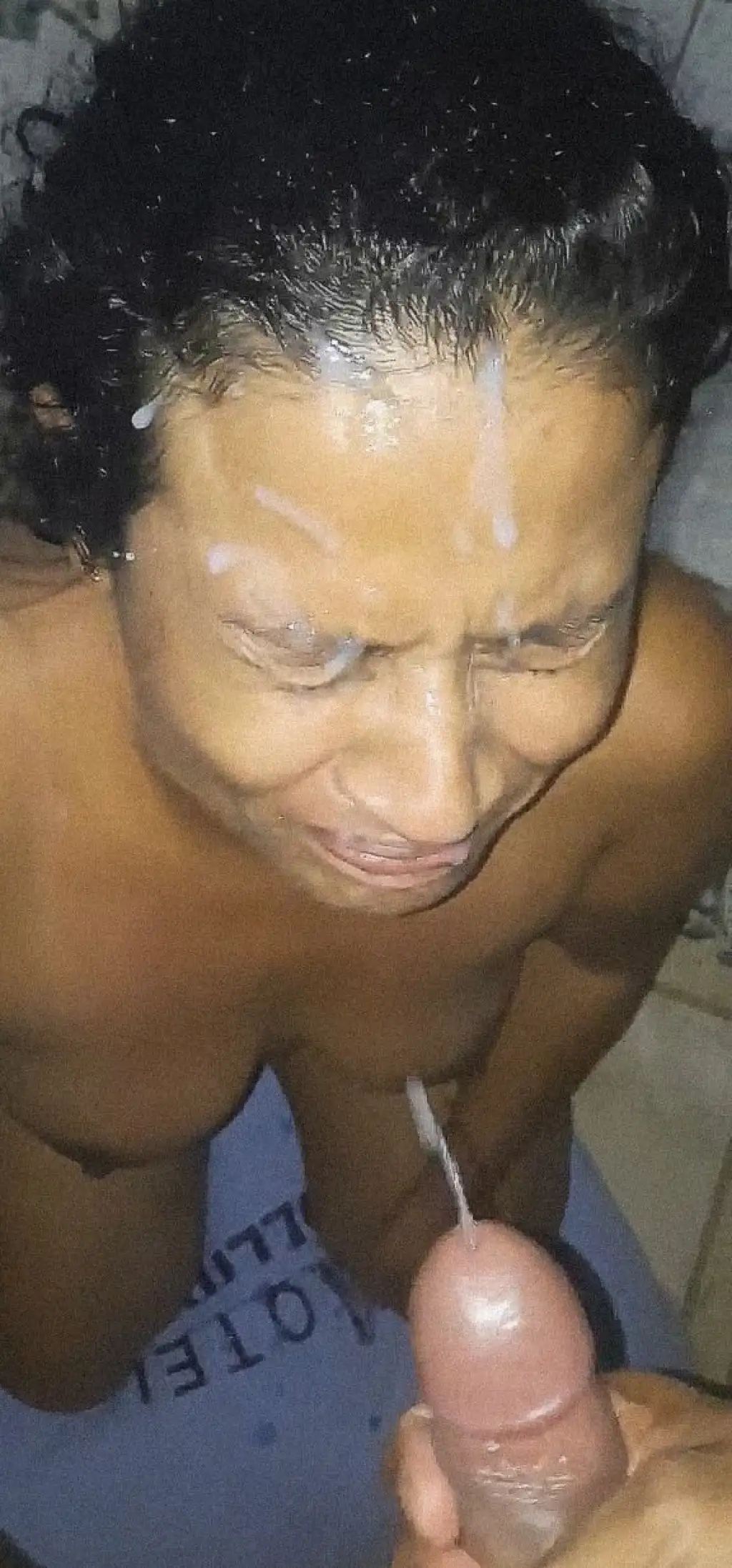 Huge cumshot on the face of a Brazilian brunette