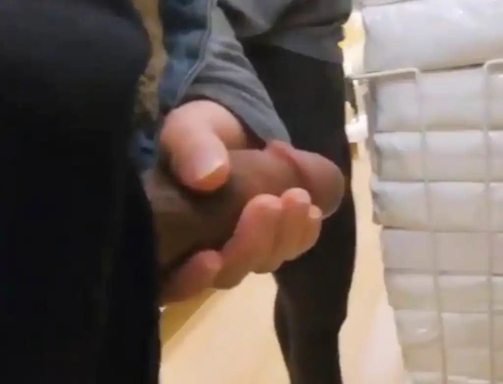 Hot slut grabbing black cock in the store and then sucking it