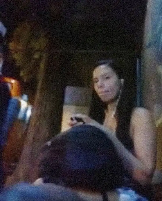 Classic! Sexy Brazilian brunette checking out the dick at the bus stop