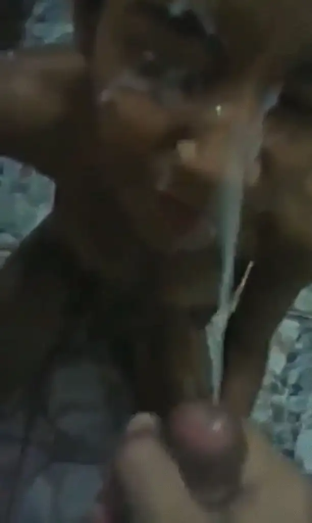 Huge cumshot on the face of the skinny Brazilian crackhead, it was a lot of cum