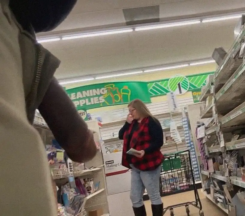 Hot MILF in big boots looking at products in the store