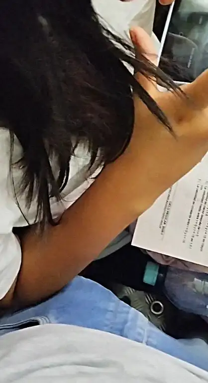 Latina teen feeling the bulge on the bus 