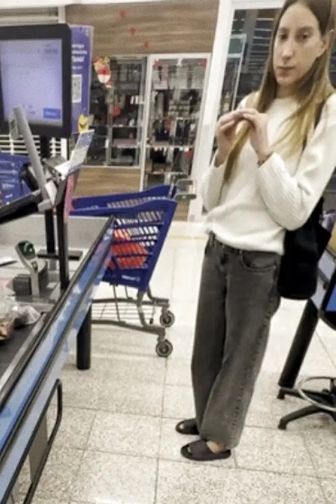 Sexy blonde at the grocery store checkout looking at bulge, she loved it