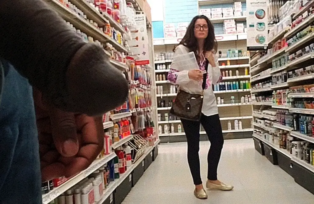 MILF looked at the black cock in the store