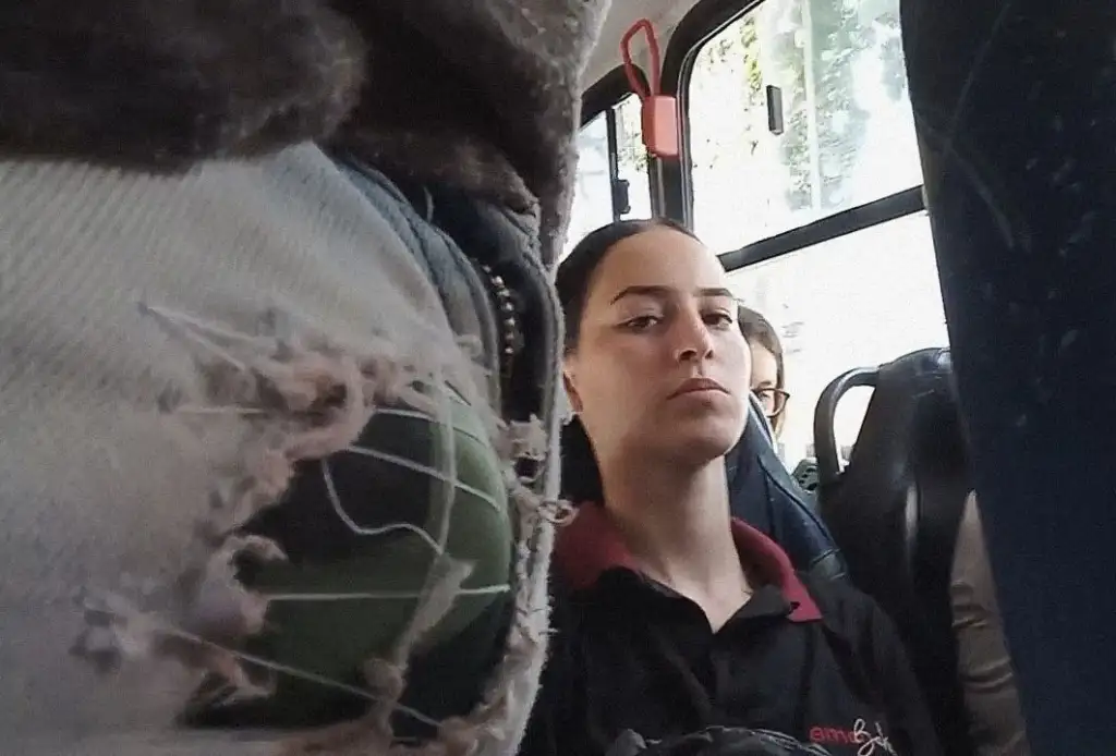 Brazilian teen going to work and looking at bulge on the bus